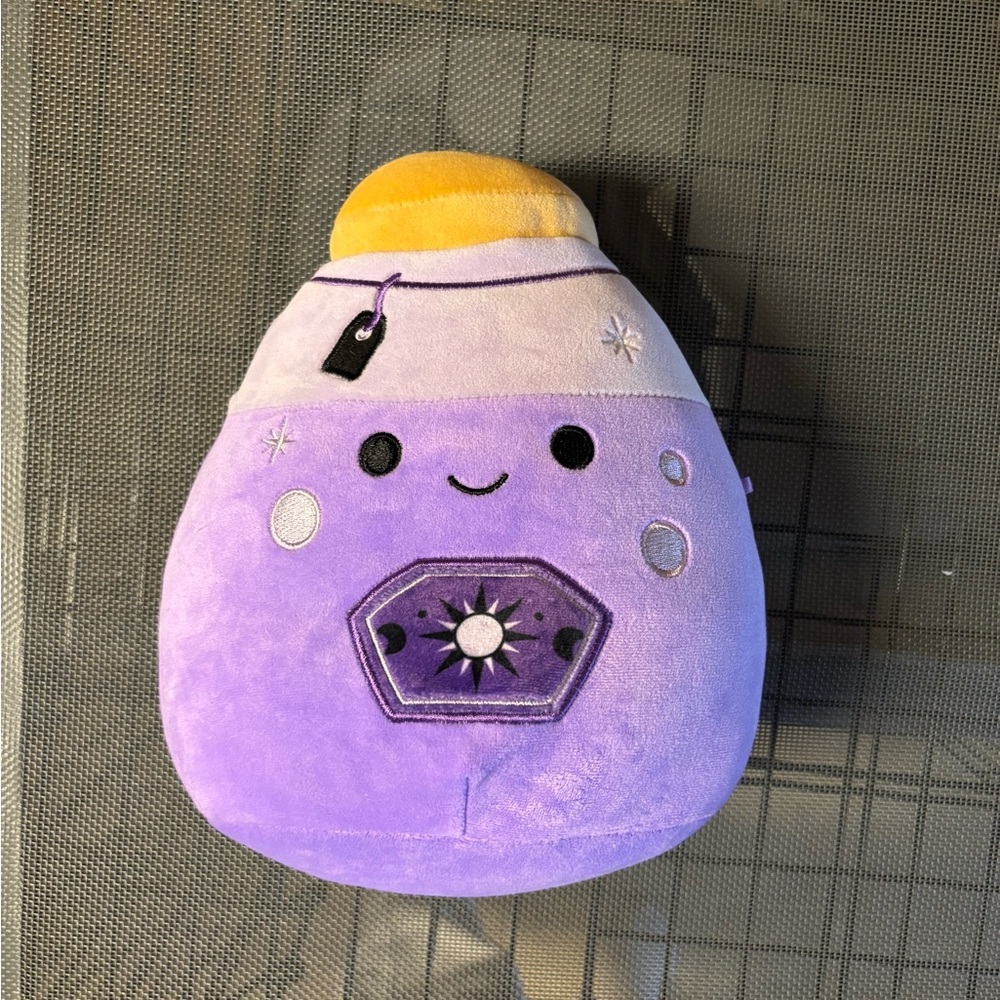 Purple and Yellow Stuffed Animal Toy